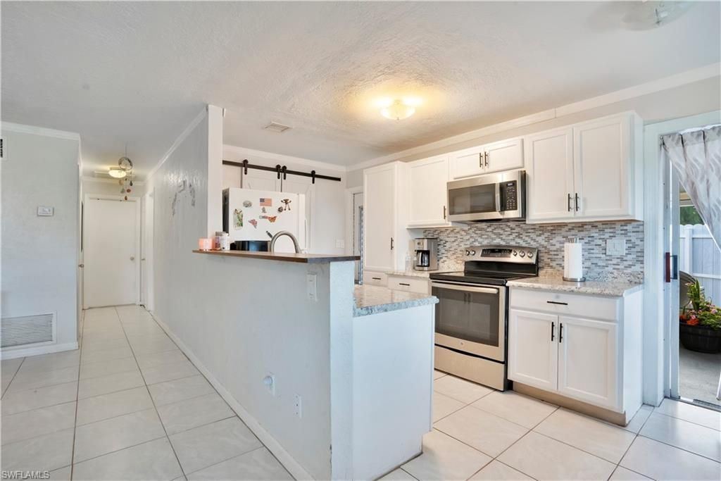 1102 Kanza Ct, Lehigh Acres, FL 33936 Photo