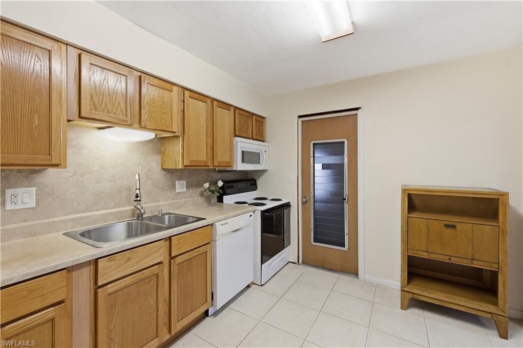 106 E Lake Dr , Lehigh Acres, FL 33936 Photo