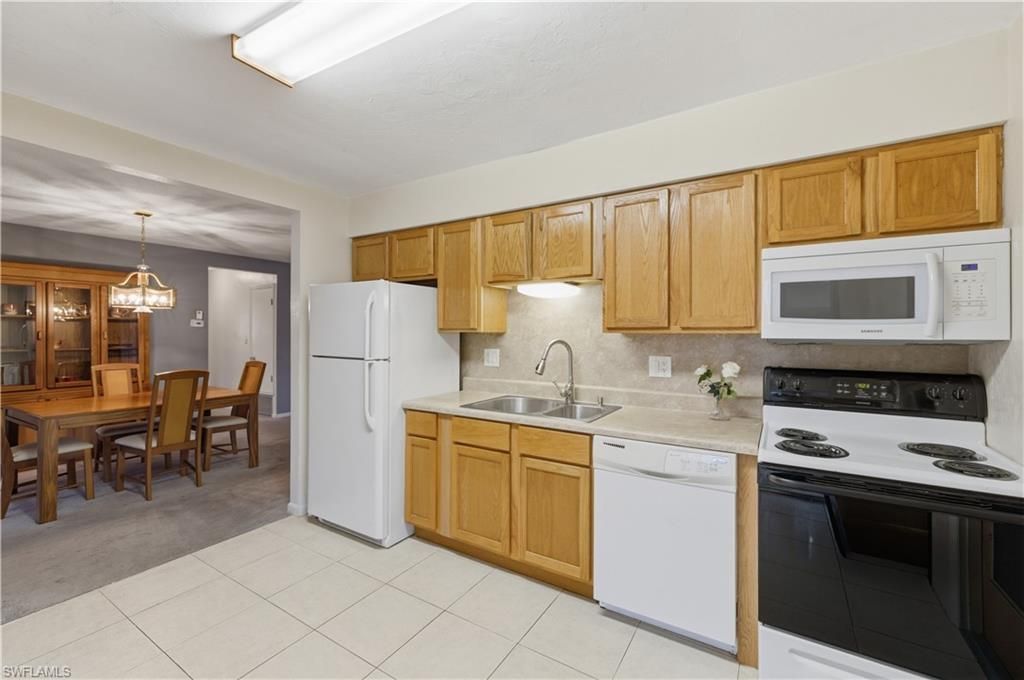 106 E Lake Dr , Lehigh Acres, FL 33936 Photo