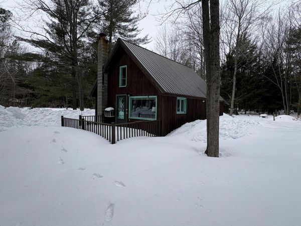 7125 Clinton Avenue, Carp Lake, MI 49718