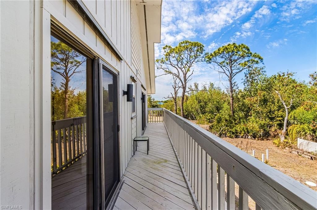 8677 Whispering Pines Dr , Saint James City, FL 33956 Photo