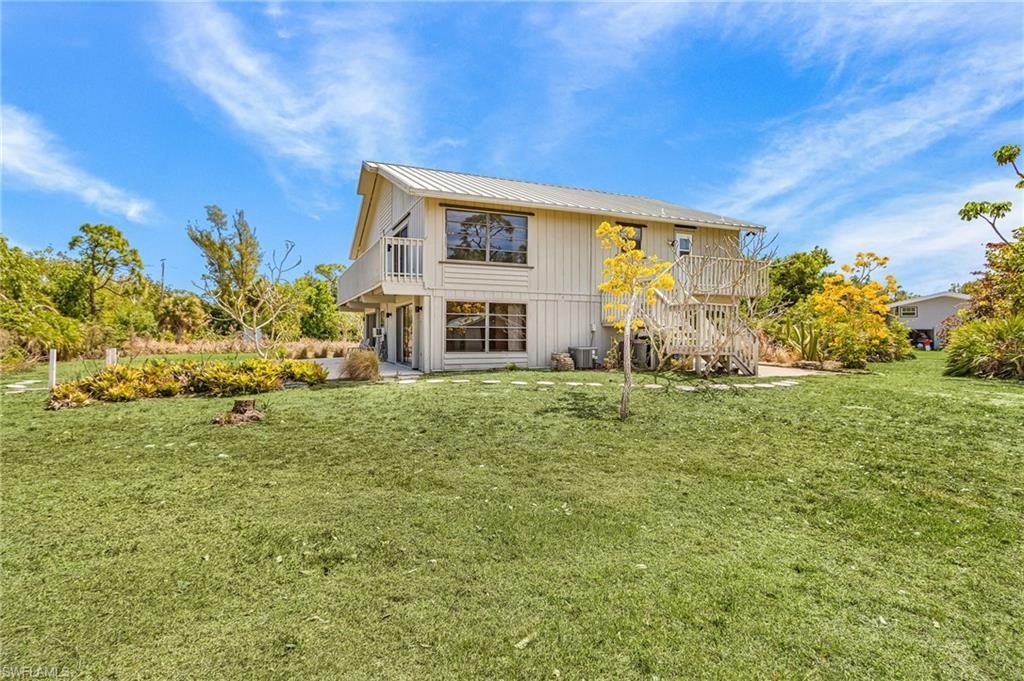 8677 Whispering Pines Dr , Saint James City, FL 33956 Photo