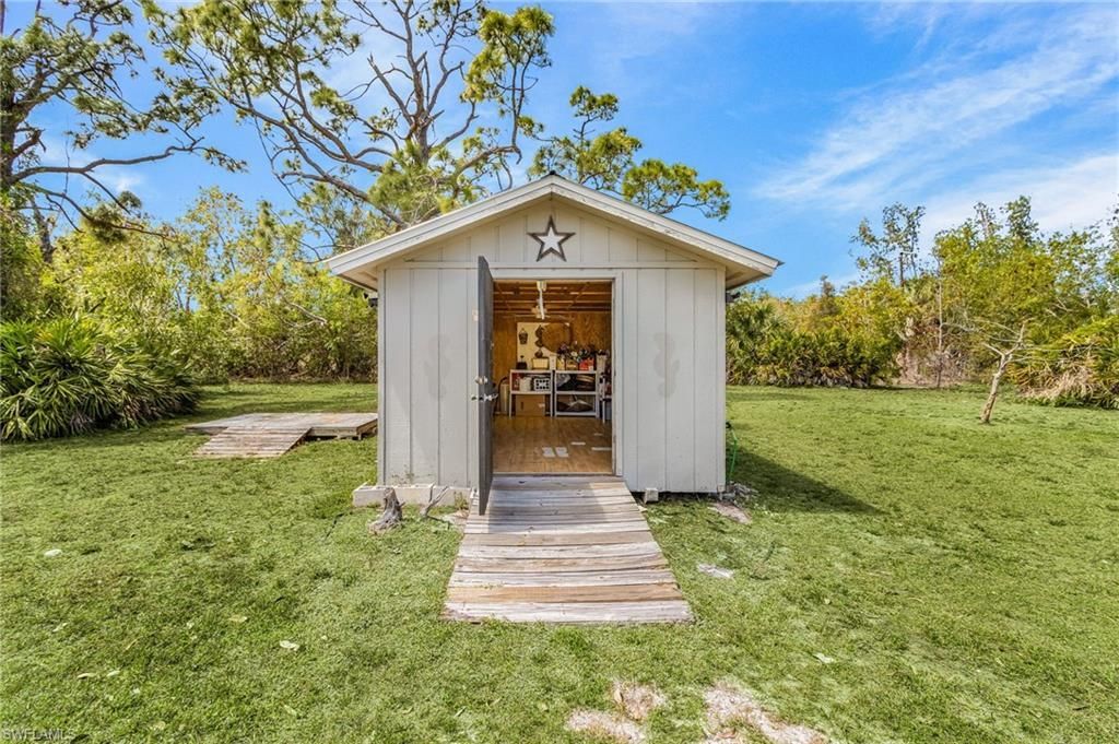 8677 Whispering Pines Dr , Saint James City, FL 33956 Photo