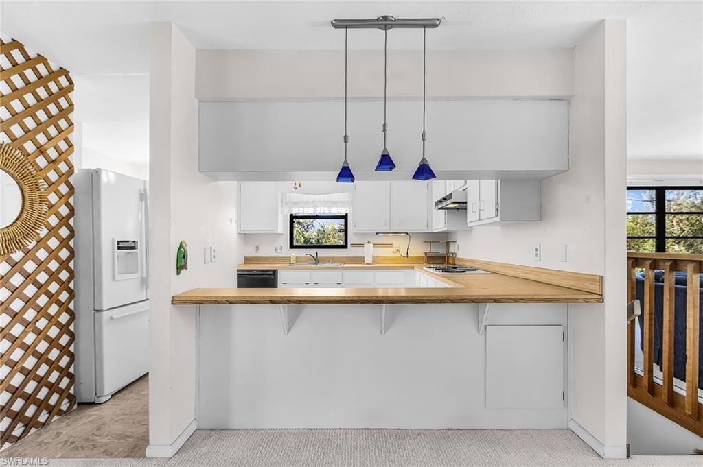 8677 Whispering Pines Dr , Saint James City, FL 33956 Photo