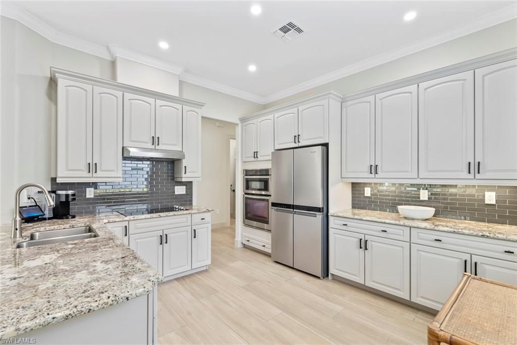 3599 Grand Cypress Dr, Naples, FL 34119 Photo