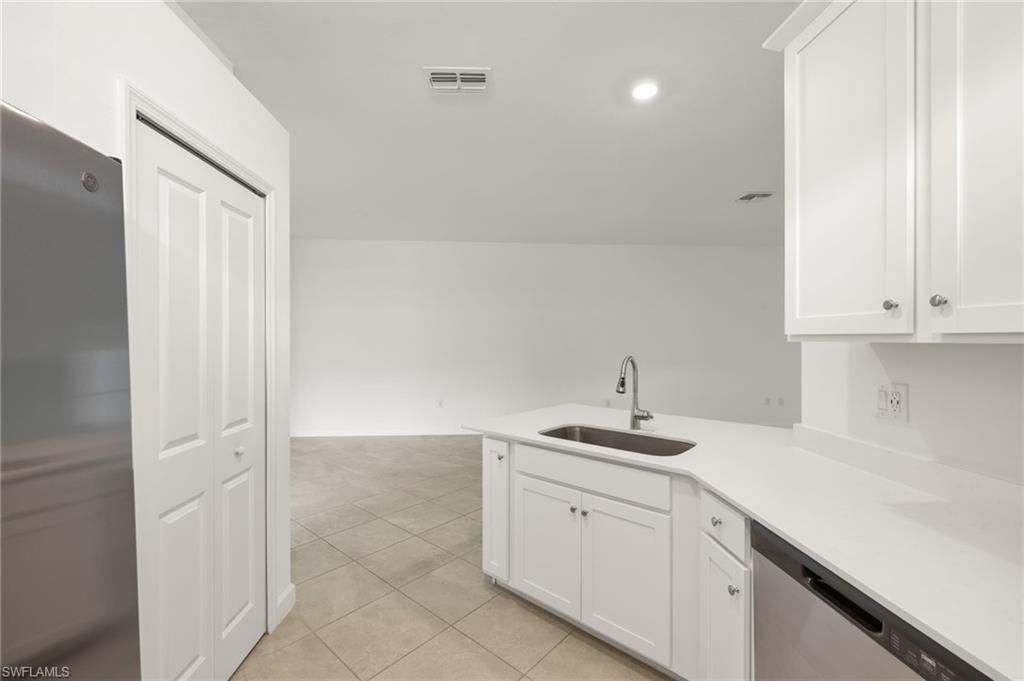 9077 Leatherwood Loop, Lehigh Acres, FL 33936 Photo