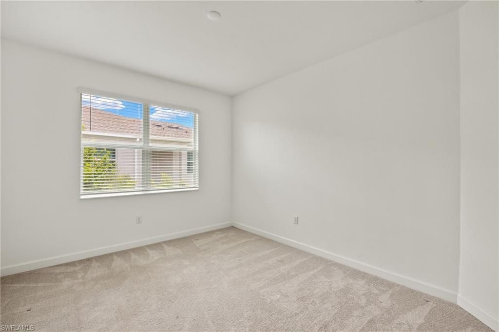 9077 Leatherwood Loop, Lehigh Acres, FL 33936 Photo