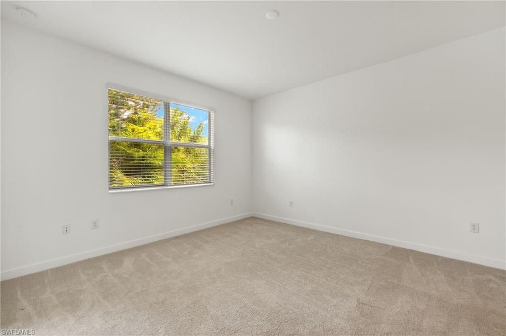 9077 Leatherwood Loop, Lehigh Acres, FL 33936 Photo