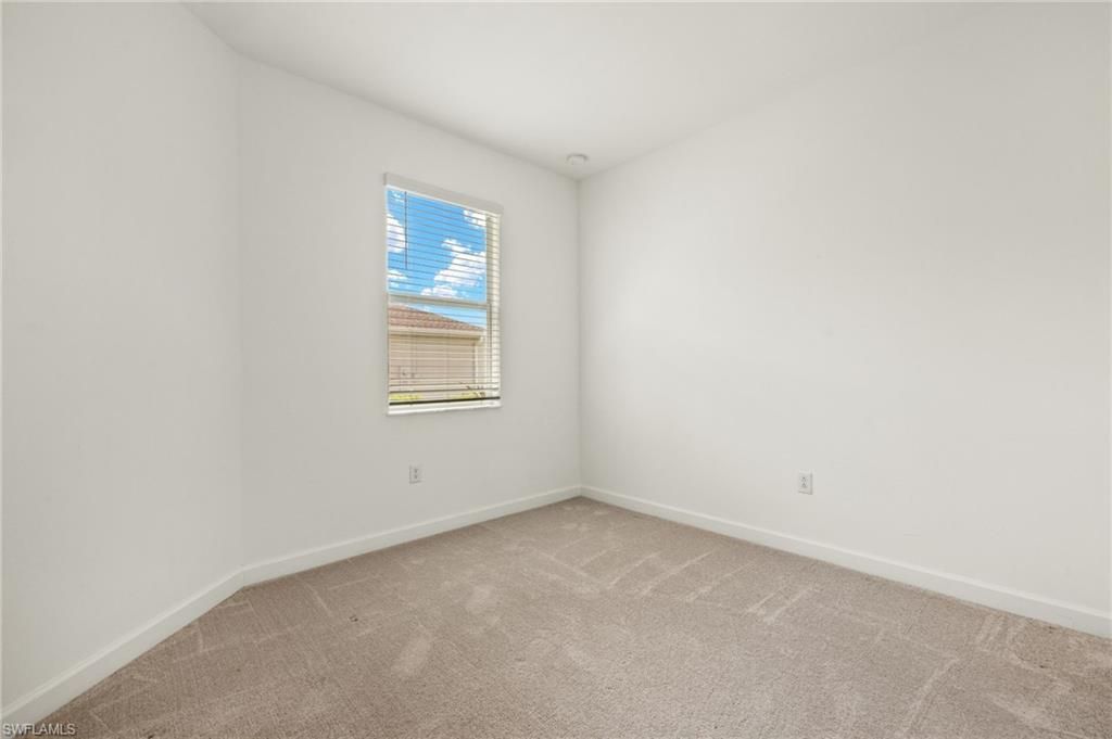 9077 Leatherwood Loop, Lehigh Acres, FL 33936 Photo