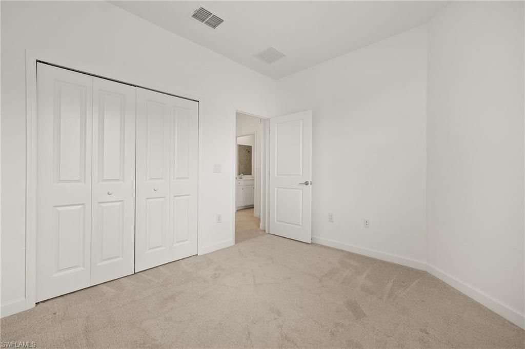 9077 Leatherwood Loop, Lehigh Acres, FL 33936 Photo