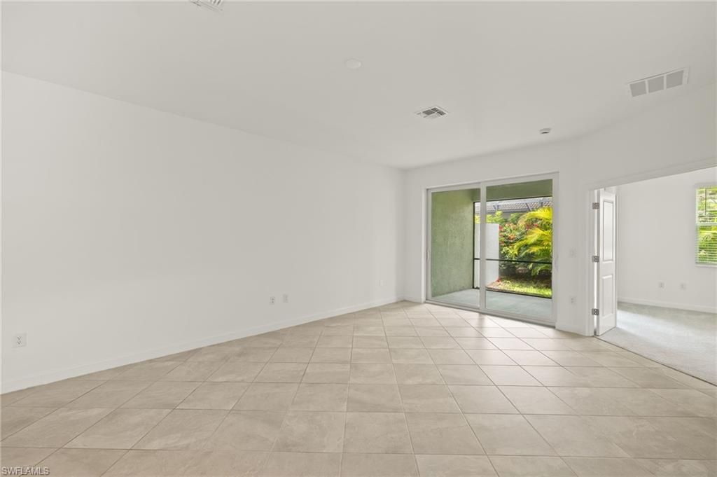 9077 Leatherwood Loop, Lehigh Acres, FL 33936 Photo