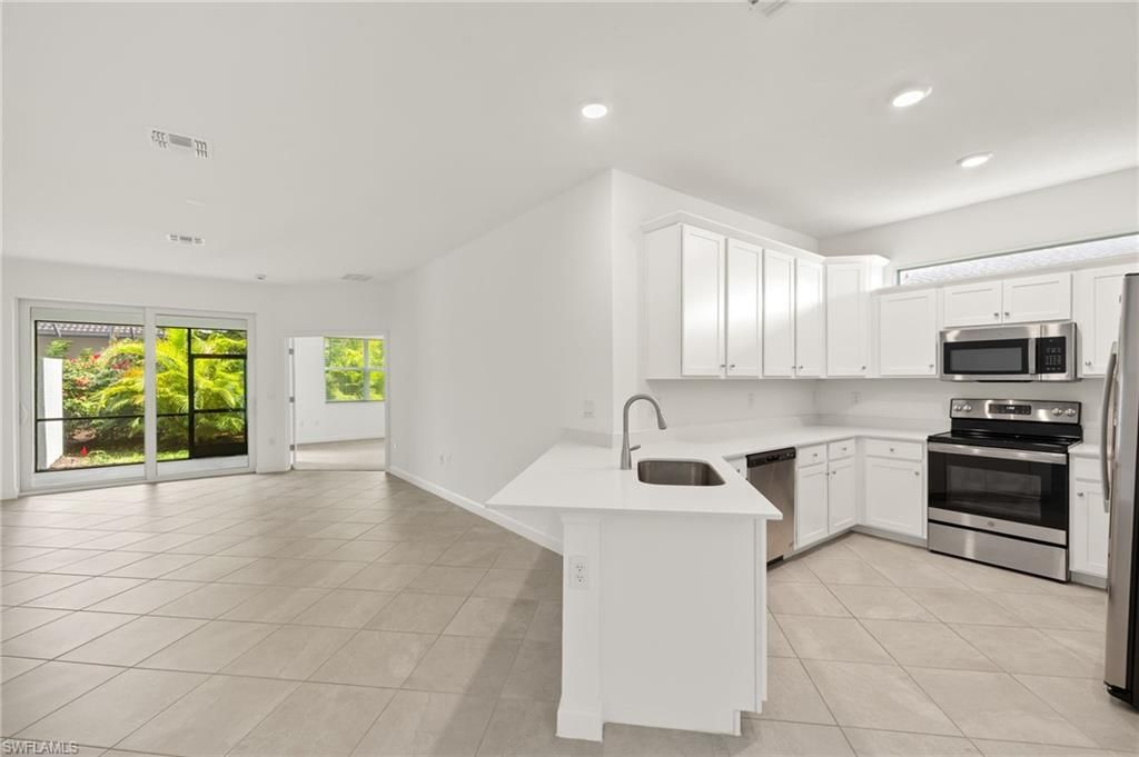 9077 Leatherwood Loop, Lehigh Acres, FL 33936 Photo