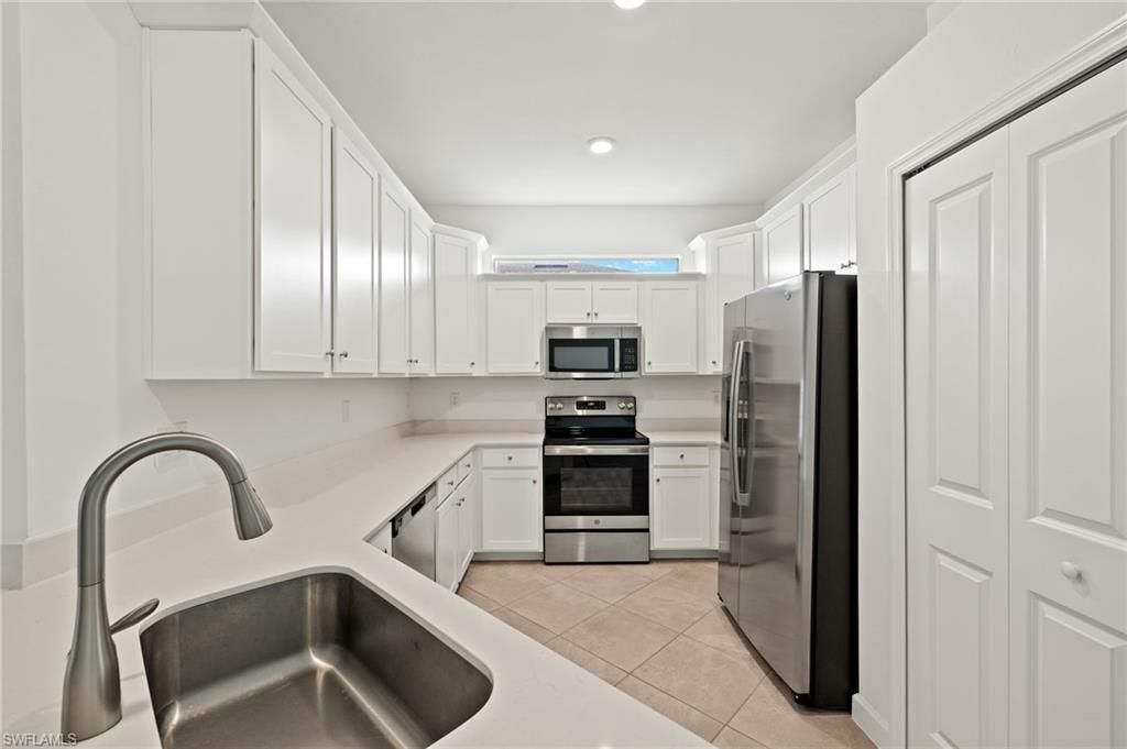 9077 Leatherwood Loop, Lehigh Acres, FL 33936 Photo