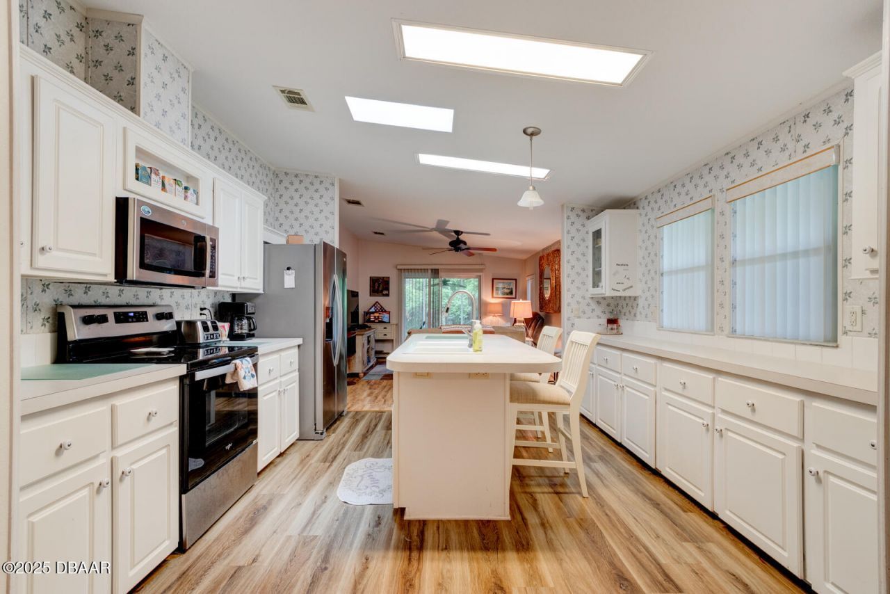 387 Marsh Landing Loop, Oak Hill, FL 32759 Photo