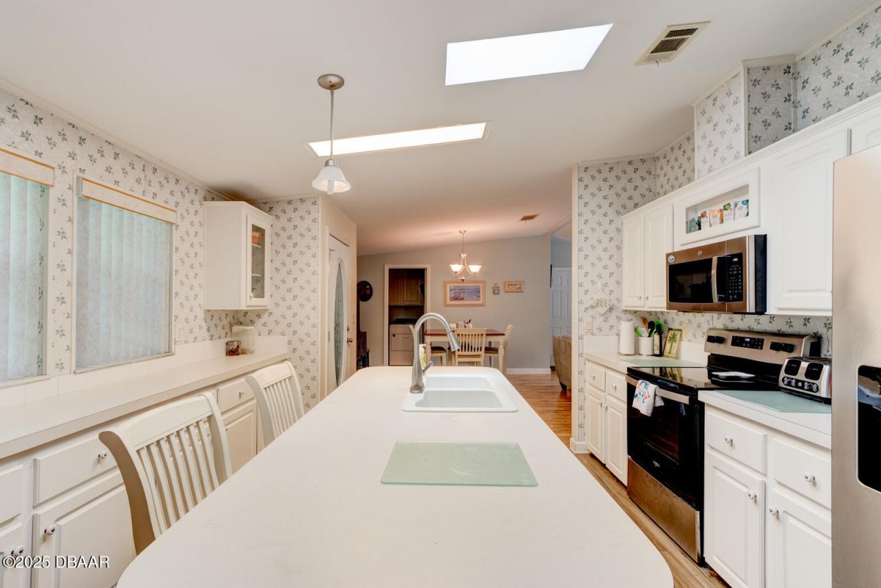 387 Marsh Landing Loop, Oak Hill, FL 32759 Photo