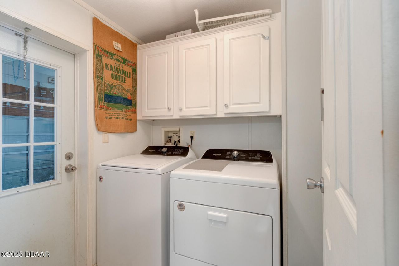 387 Marsh Landing Loop, Oak Hill, FL 32759 Photo