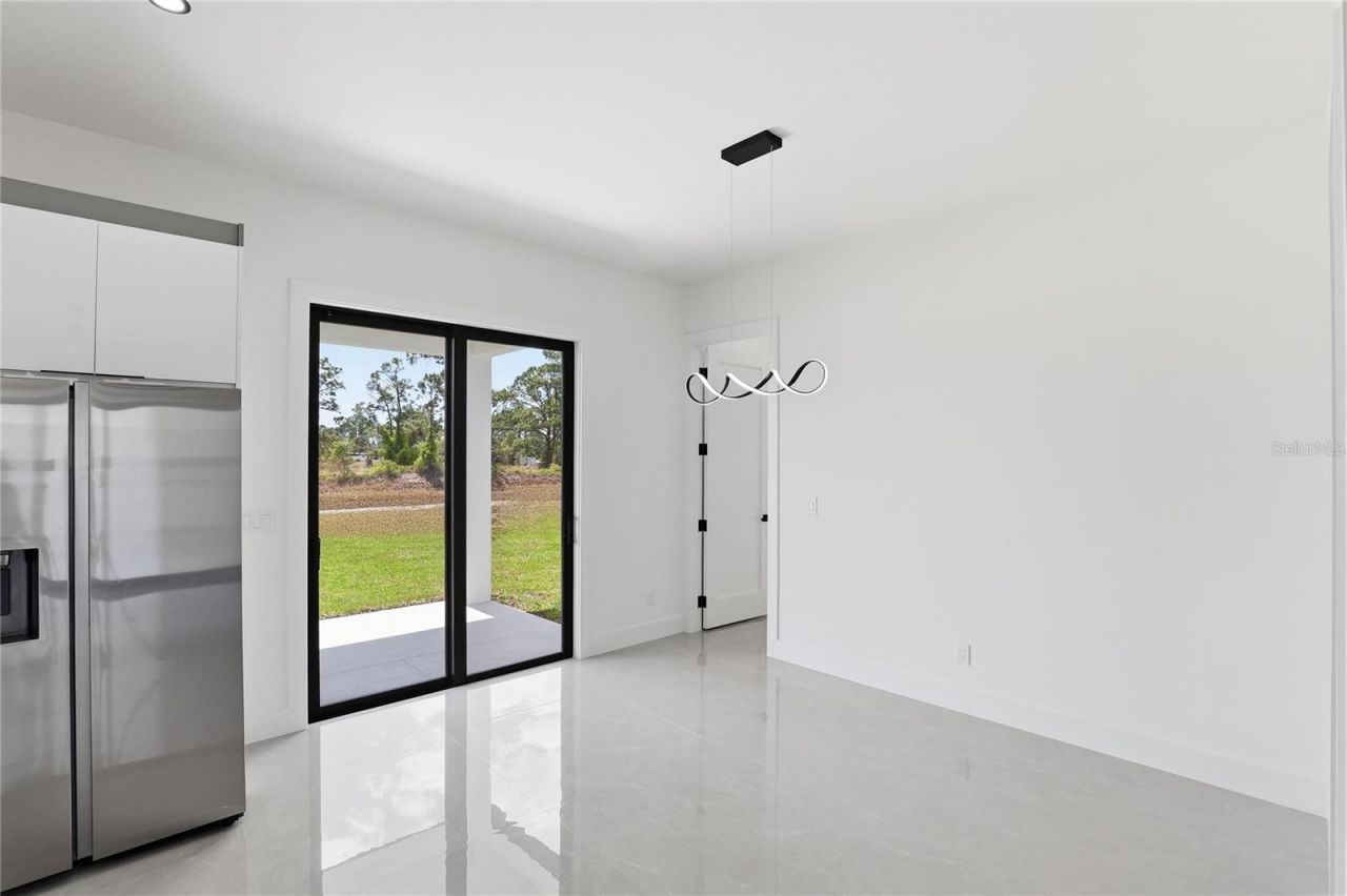 1122 S Edelweiss Street E, Lehigh Acres, FL 33974 Photo