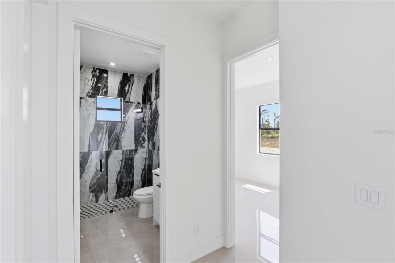 1122 S Edelweiss Street E, Lehigh Acres, FL 33974 Photo