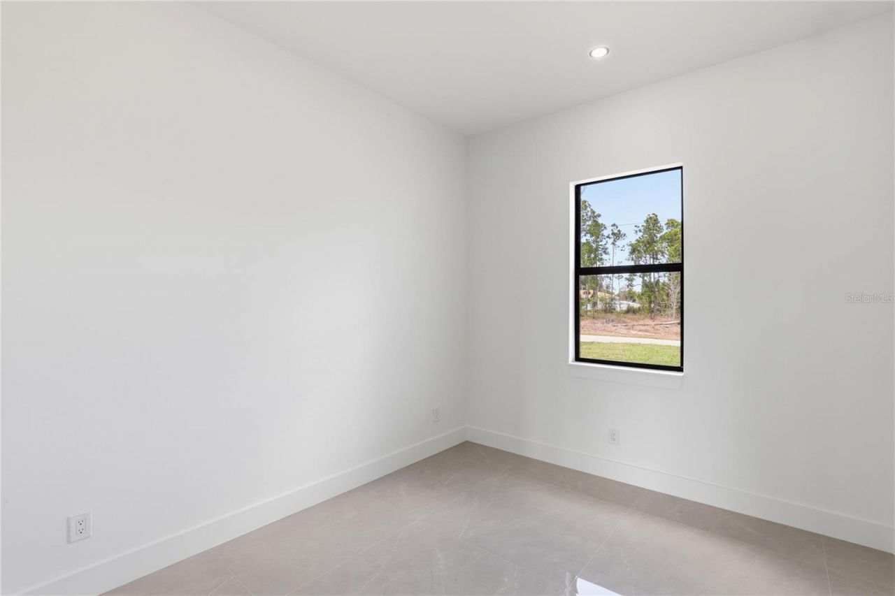 1122 S Edelweiss Street E, Lehigh Acres, FL 33974 Photo