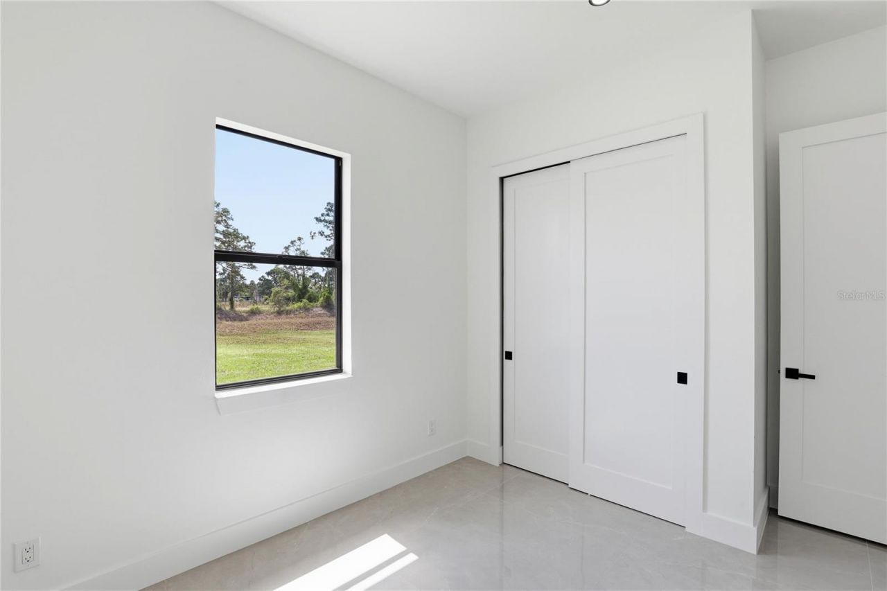 1122 S Edelweiss Street E, Lehigh Acres, FL 33974 Photo
