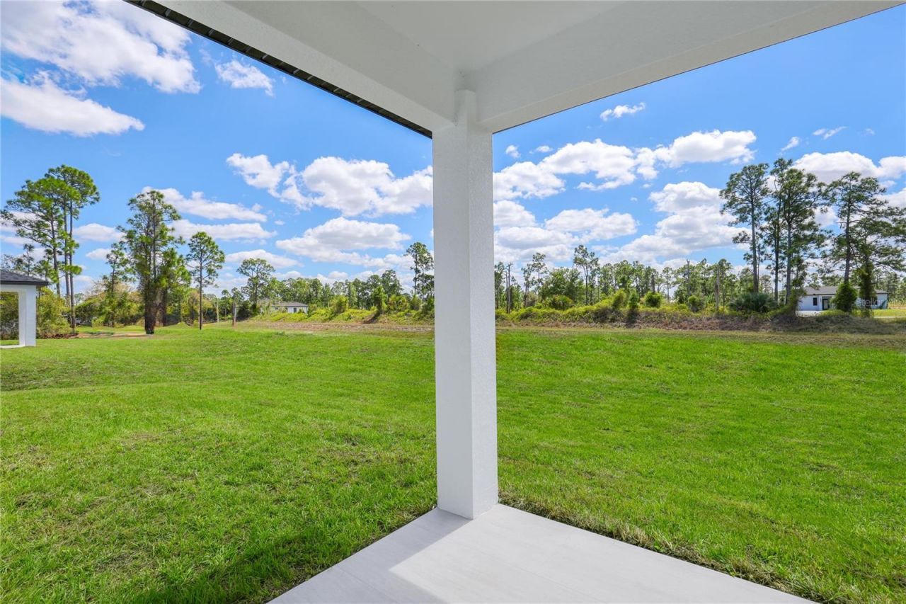 1122 S Edelweiss Street E, Lehigh Acres, FL 33974 Photo