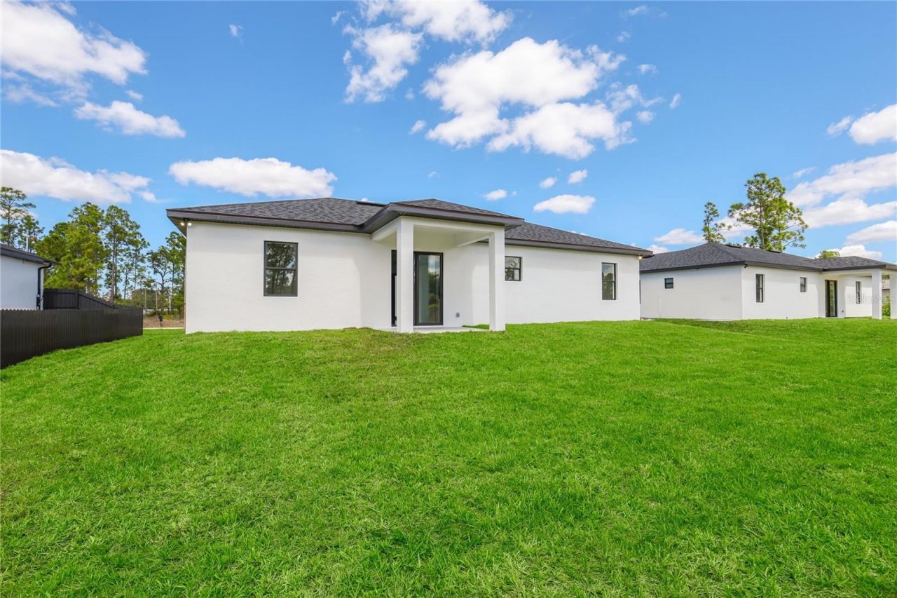 1122 S Edelweiss Street E, Lehigh Acres, FL 33974 Photo