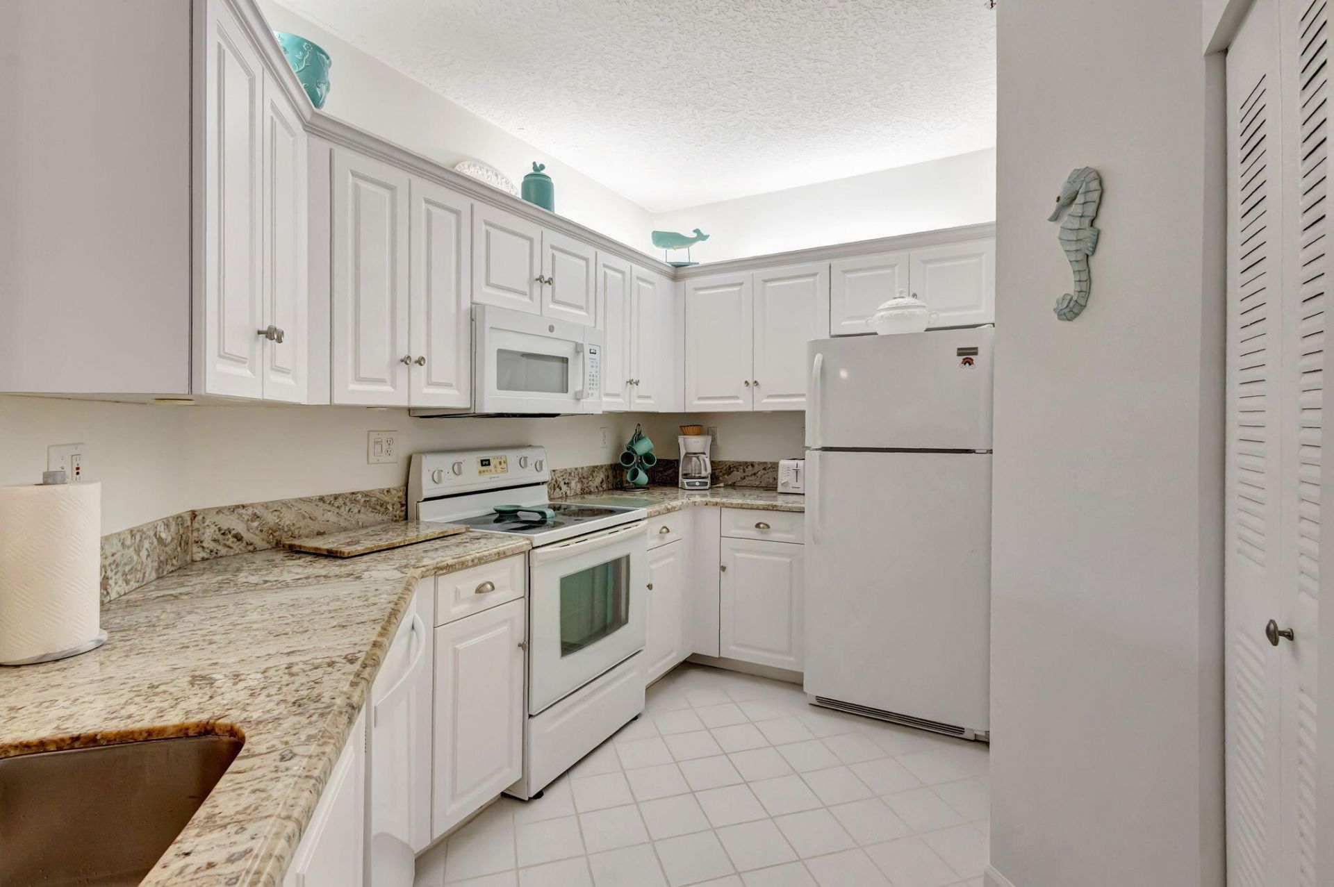 800 Uno Lago Drive, Unit 302, Juno Beach, FL 33408 Photo