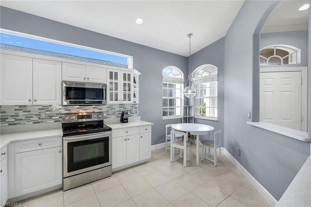 8616 Ibis Cove Cir, Naples, FL 34119 Photo