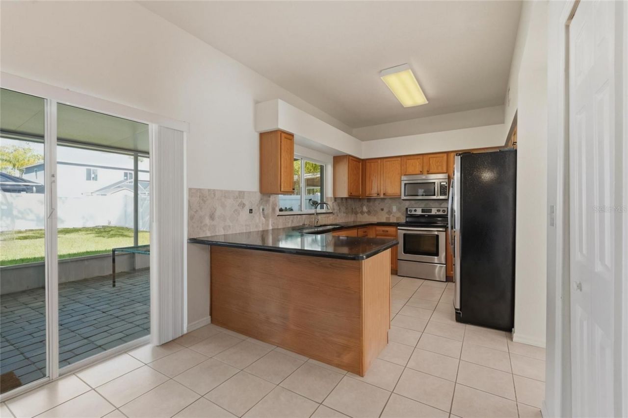 1734 Mapleleaf Boulevard, Oldsmar, FL 34677 Photo