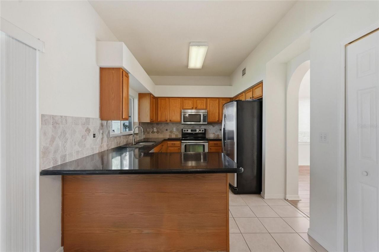 1734 Mapleleaf Boulevard, Oldsmar, FL 34677 Photo