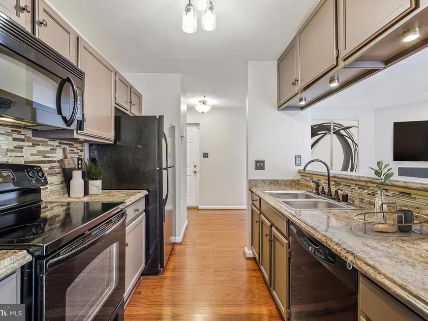 2051 Alice Avenue, Unit 2051-303, Oxon Hill, MD 20745 Main Photo