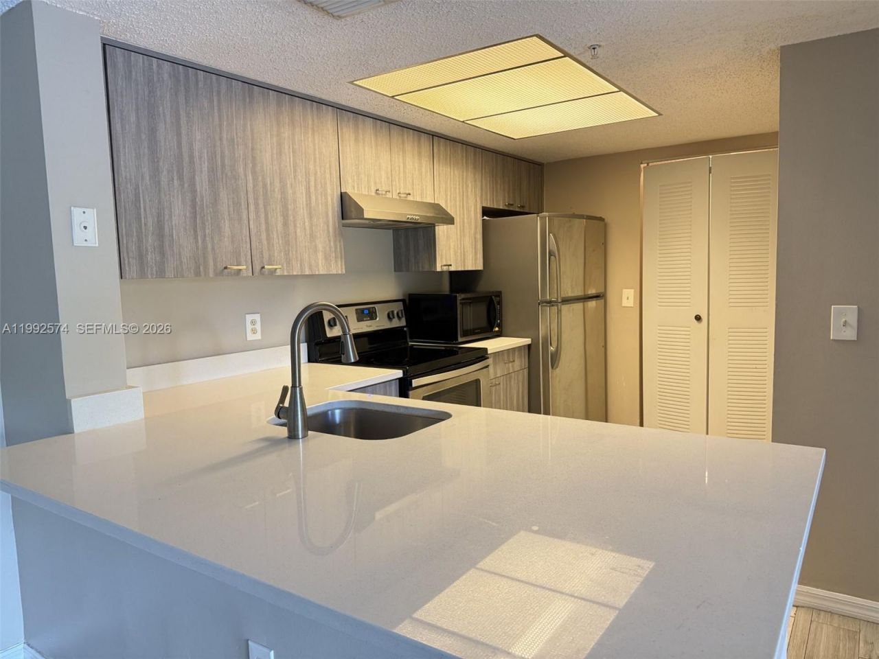 5015 Wiles Rd , Unit 207, Coconut Creek, FL 33073 Photo