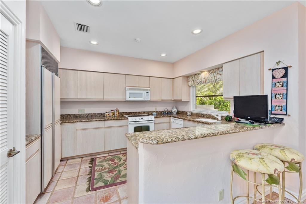 13309 NW Maplewood Road, Palm City, FL 34990 Photo