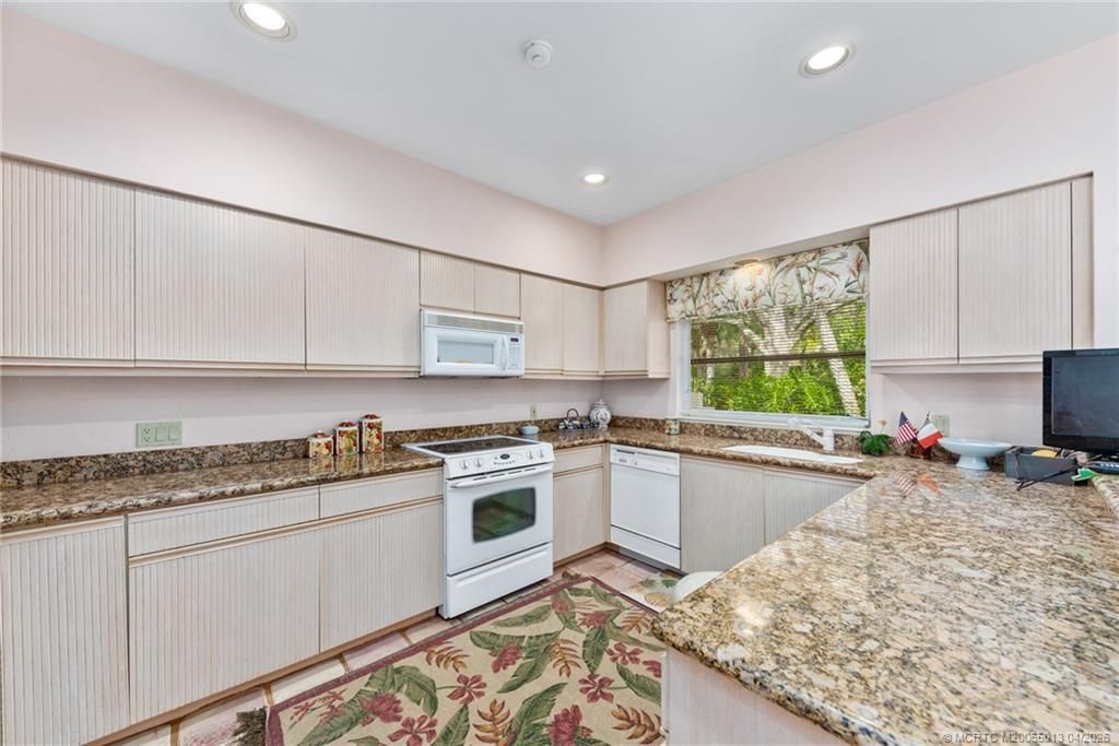 13309 NW Maplewood Road, Palm City, FL 34990 Photo