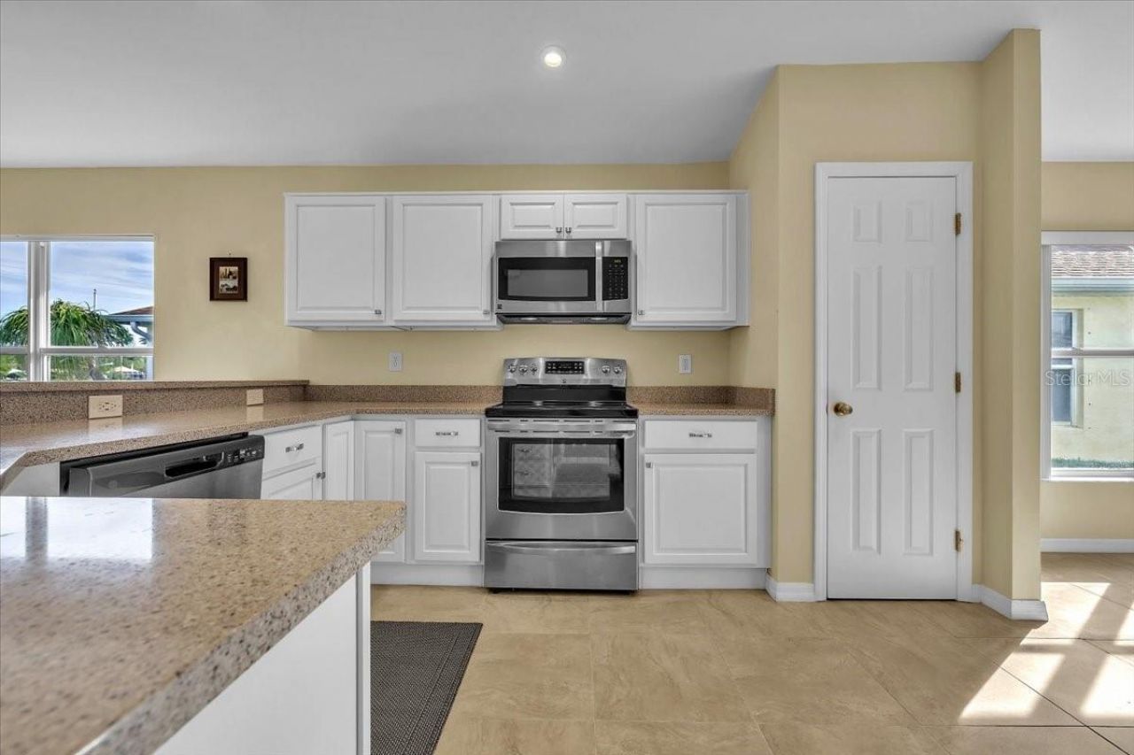 8571 Gassner Way , Lehigh Acres, FL 33972 Photo