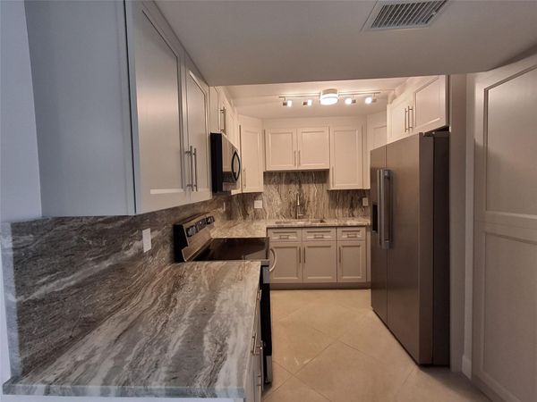 8763 Shadow Wood Boulevard, Unit 202, Coral Springs, FL 33071