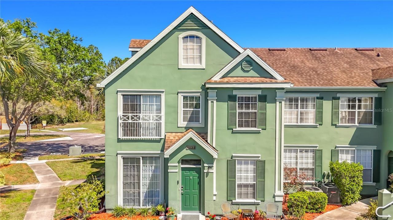 9068 Lake Chase Island Way, Unit 9068, Tampa, FL 33626 Main Photo