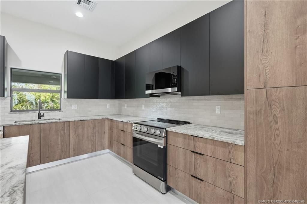 1457 SW Dow Lane, Port Saint Lucie, FL 34953 Photo