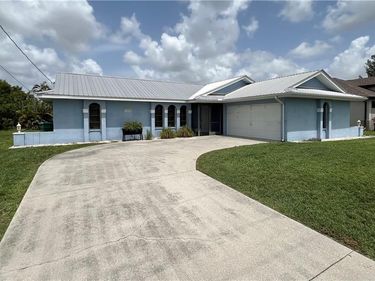 1402 SW 4th AVE, CAPE CORAL, FL 33991