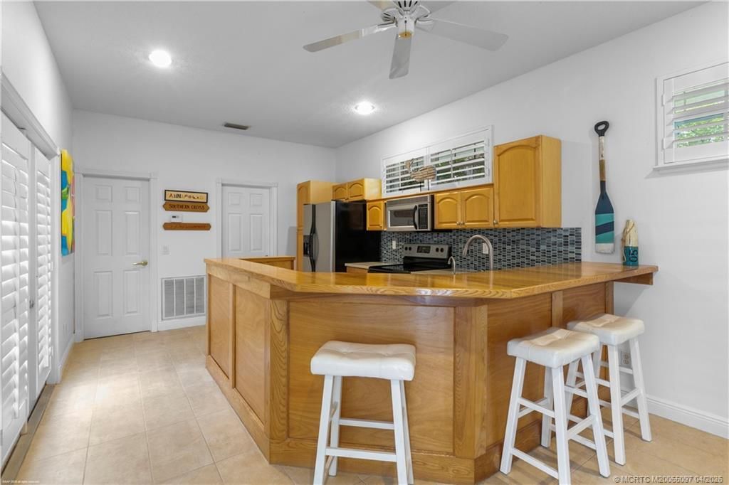 5661 SW Orchid Bay Drive, Palm City, FL 34990 Photo