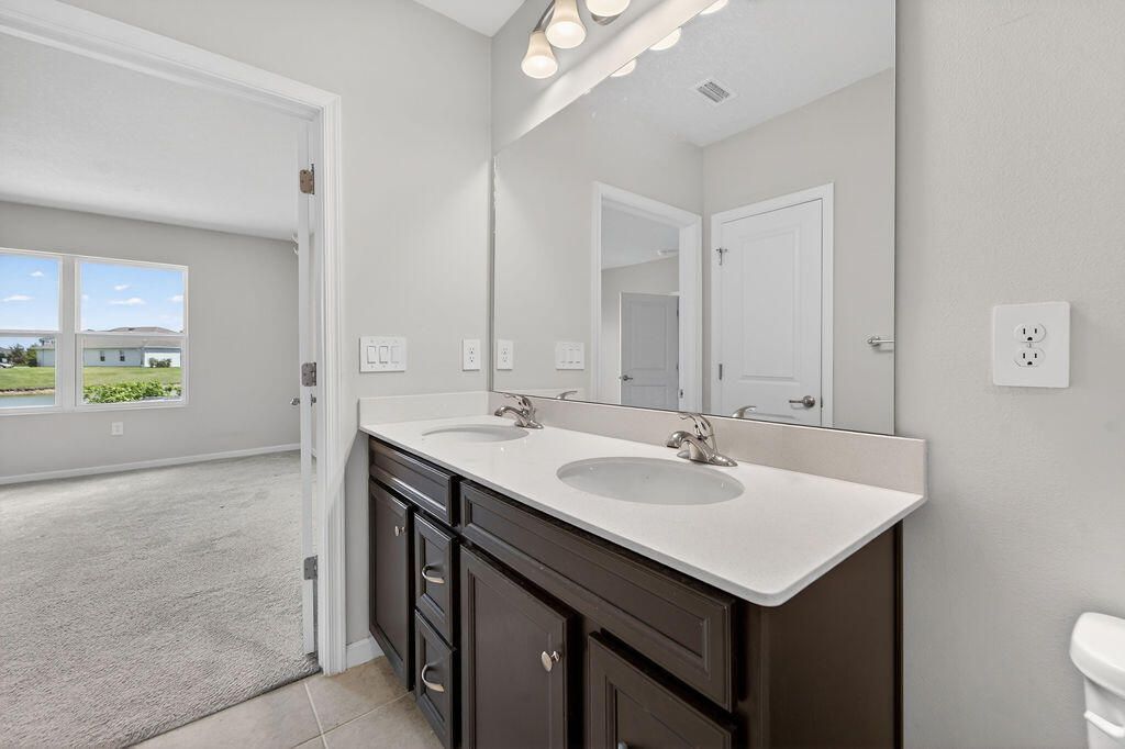 9449 SW Libertas Way, Port Saint Lucie, FL 34987 Photo