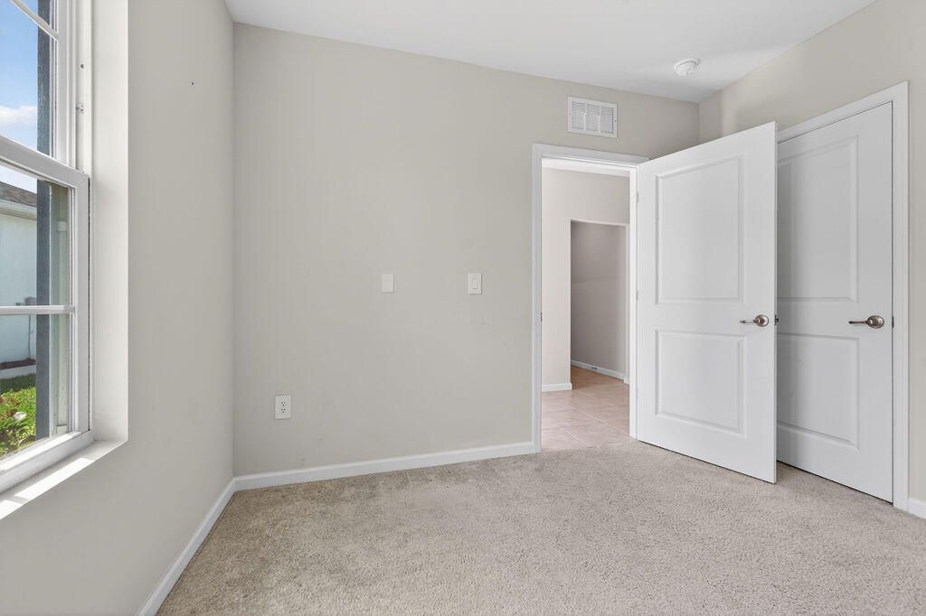 9449 SW Libertas Way, Port Saint Lucie, FL 34987 Photo