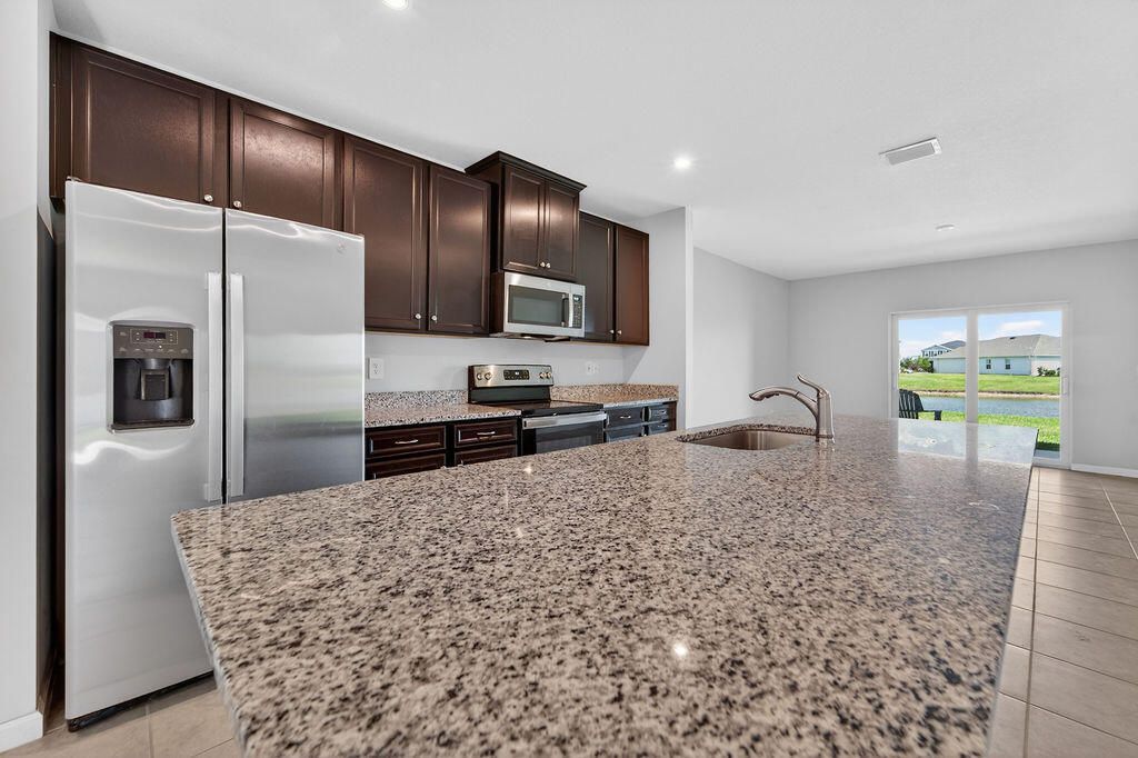 9449 SW Libertas Way, Port Saint Lucie, FL 34987 Photo