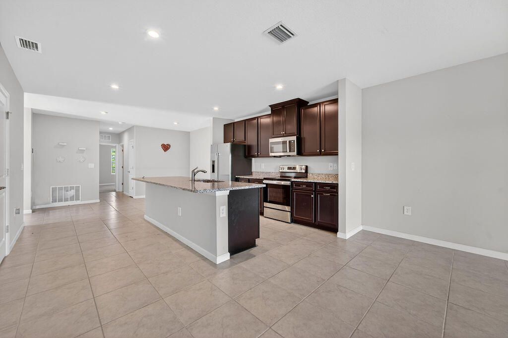 9449 SW Libertas Way, Port Saint Lucie, FL 34987 Photo