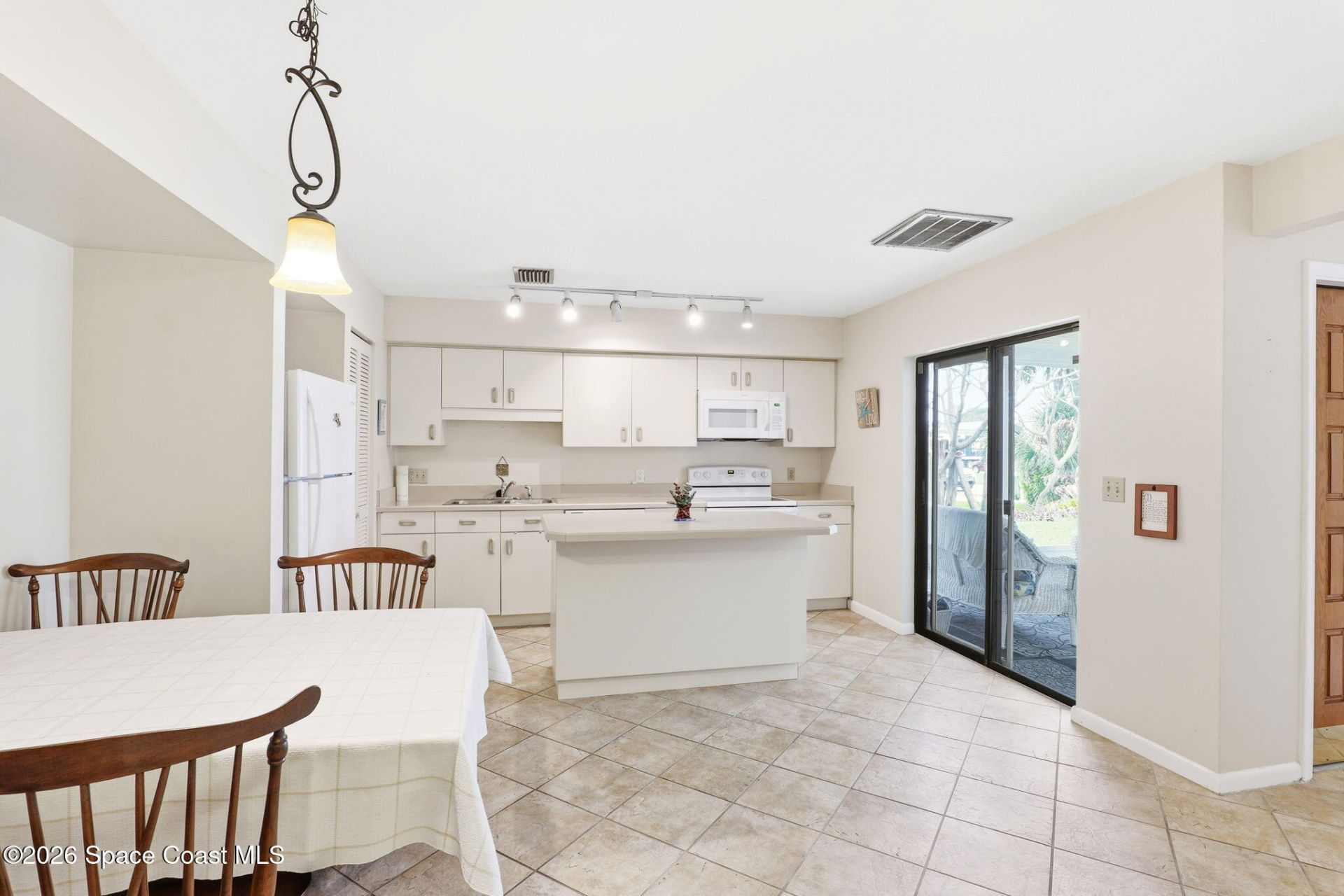 6903 Orange Avenue , Unit A, Cape Canaveral, FL 32920 Photo