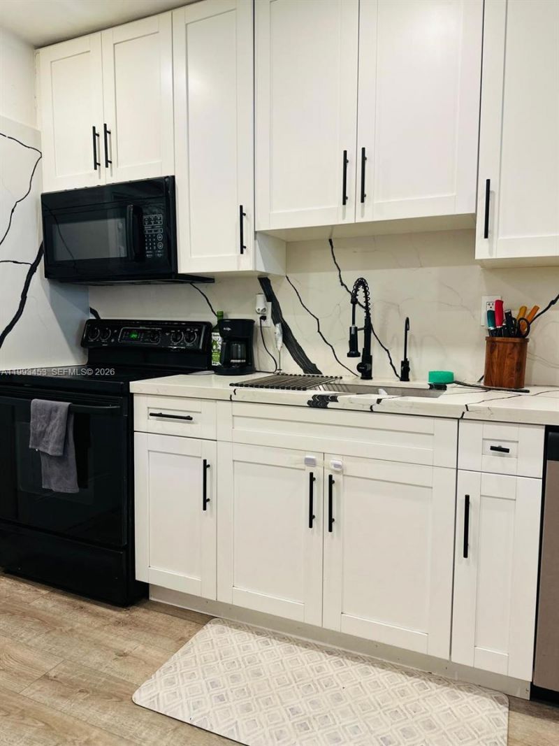 1002 NE 119th St , Unit F, Biscayne Park, FL 33161 Photo