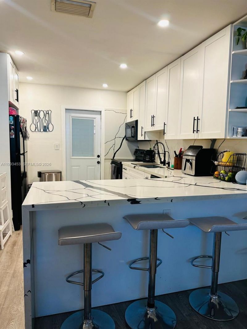 1002 NE 119th St , Unit F, Biscayne Park, FL 33161 Photo