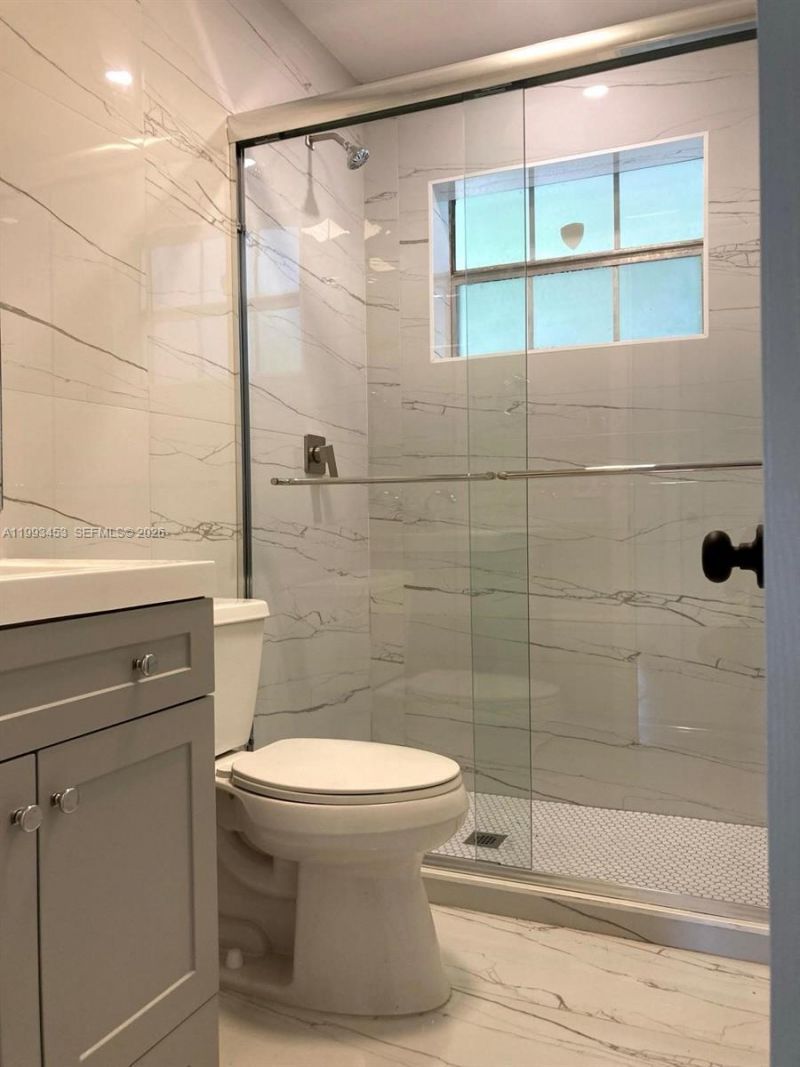 1002 NE 119th St , Unit F, Biscayne Park, FL 33161 Photo