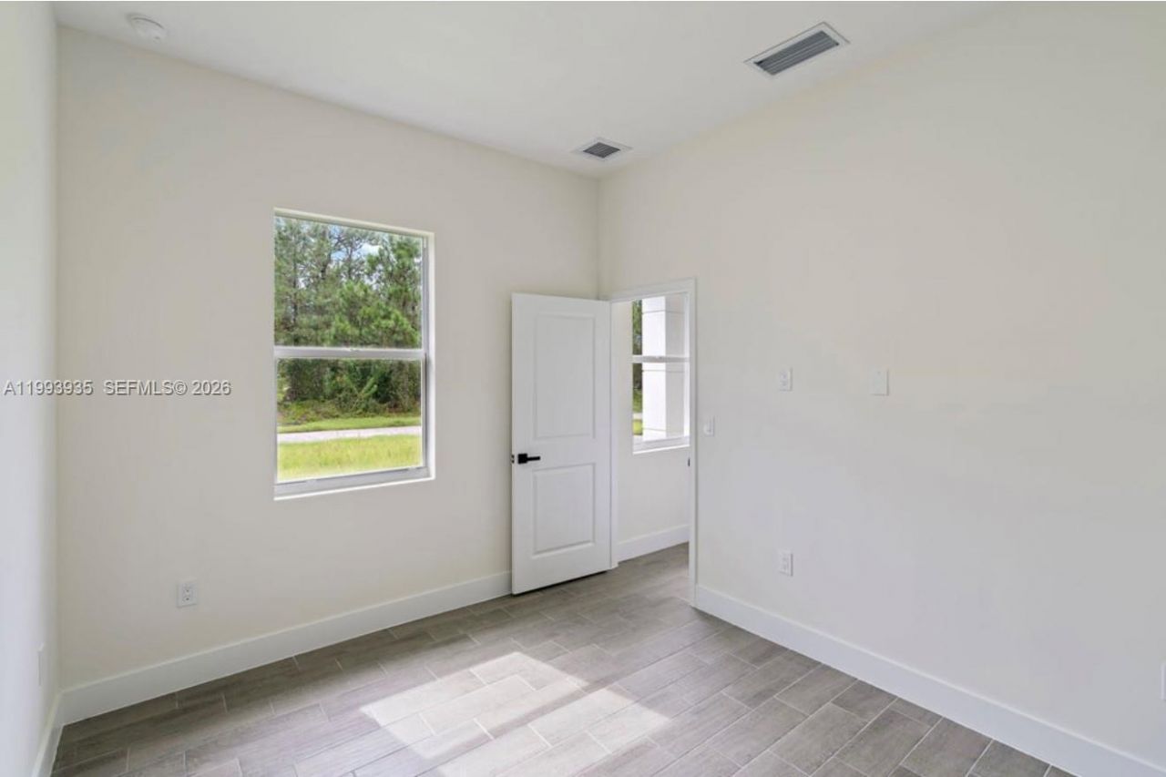 710 Peacock Ave, Lehigh Acres, FL 33974 Photo