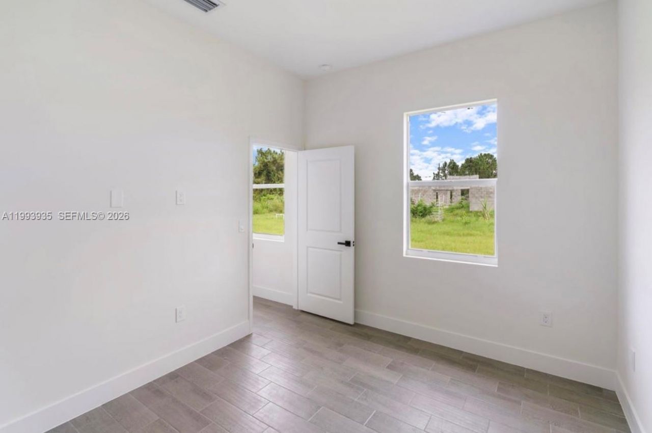 710 Peacock Ave, Lehigh Acres, FL 33974 Photo